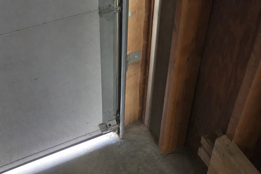 Vertical track and jamb brackets on a garage door in Amarillo, TX